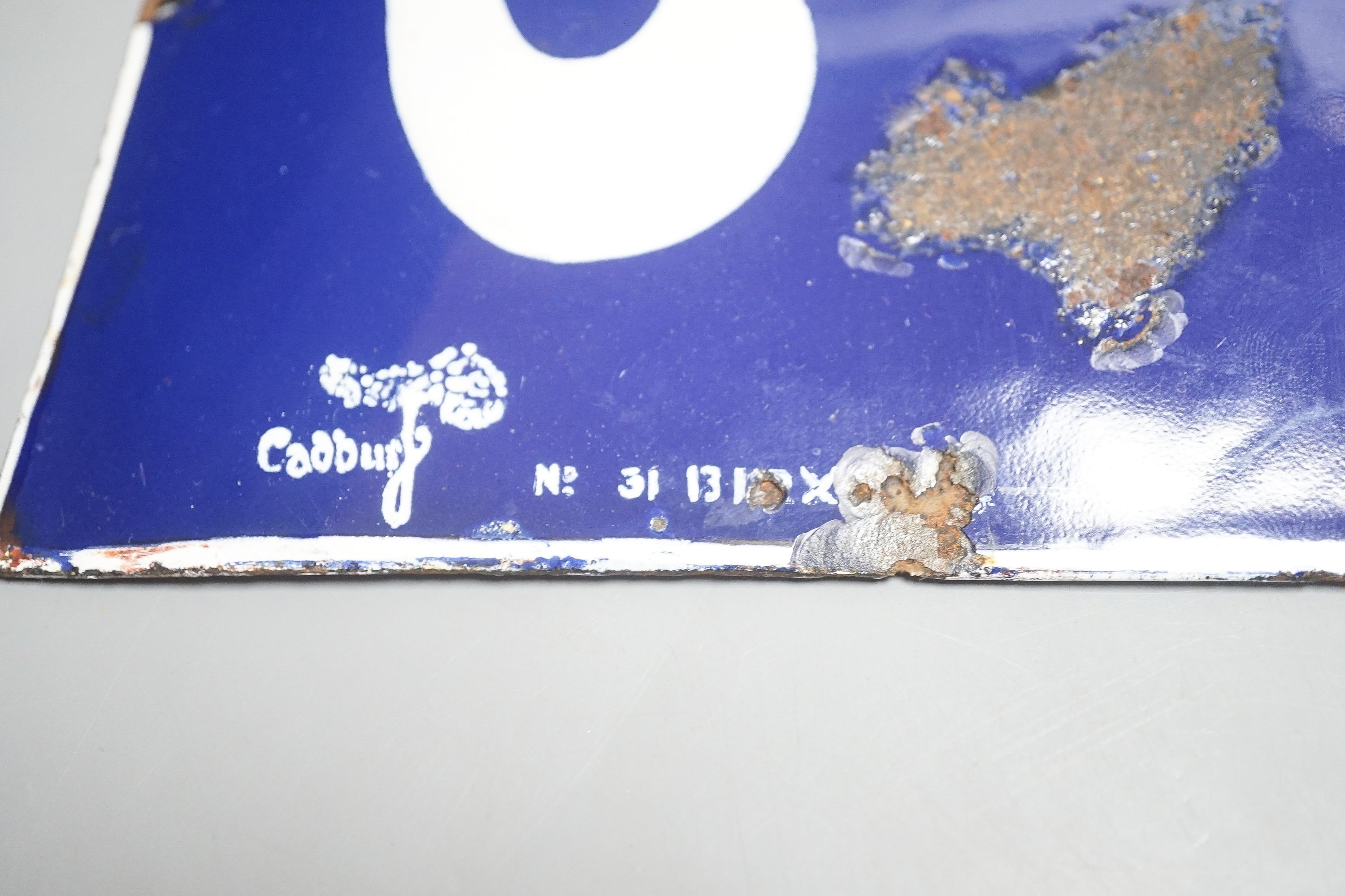 A Cadburys cocoa advertising enamel sign 15x35cm